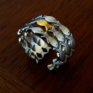 One Gold Fish - Swimming Against the Current